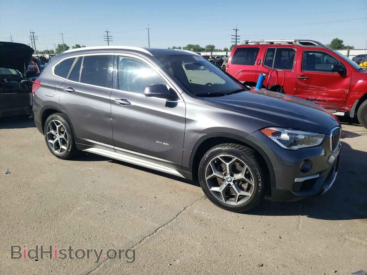 2017 BMW X1 - VIN: WBXHT3Z37H4A52020 - Фото 4
