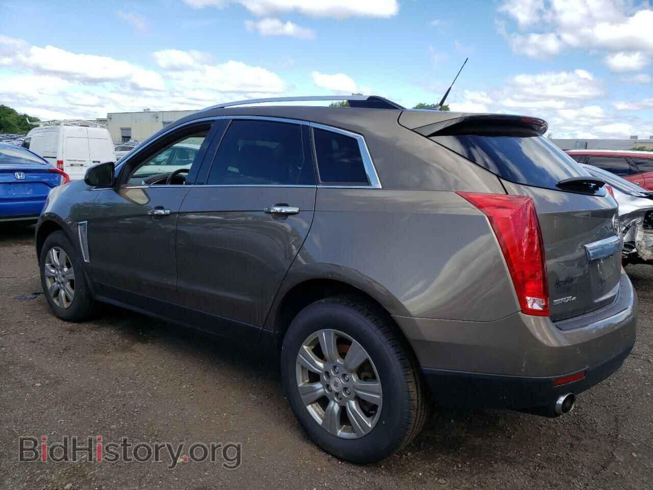 2014 CADILLAC SRX - VIN: 3GYFNEE38ES557227 - Фото 2