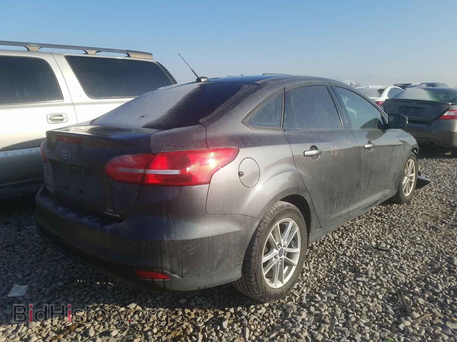 2015 FORD FOCUS - VIN: 1FADP3F21FL334378 - Photo 4