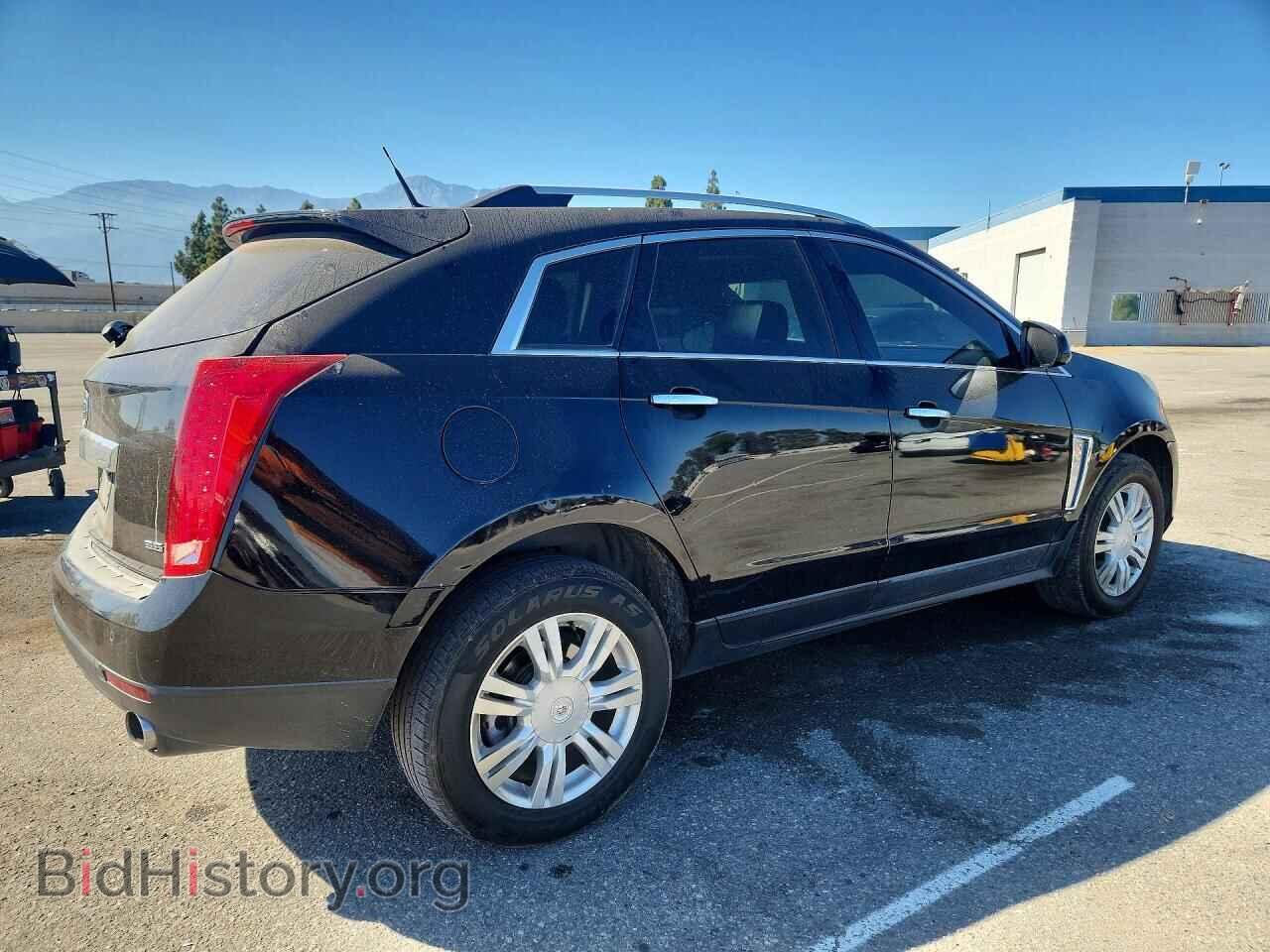 2013 CADILLAC SRX - VIN: 3GYFNCE36DS634843 - Фото 3
