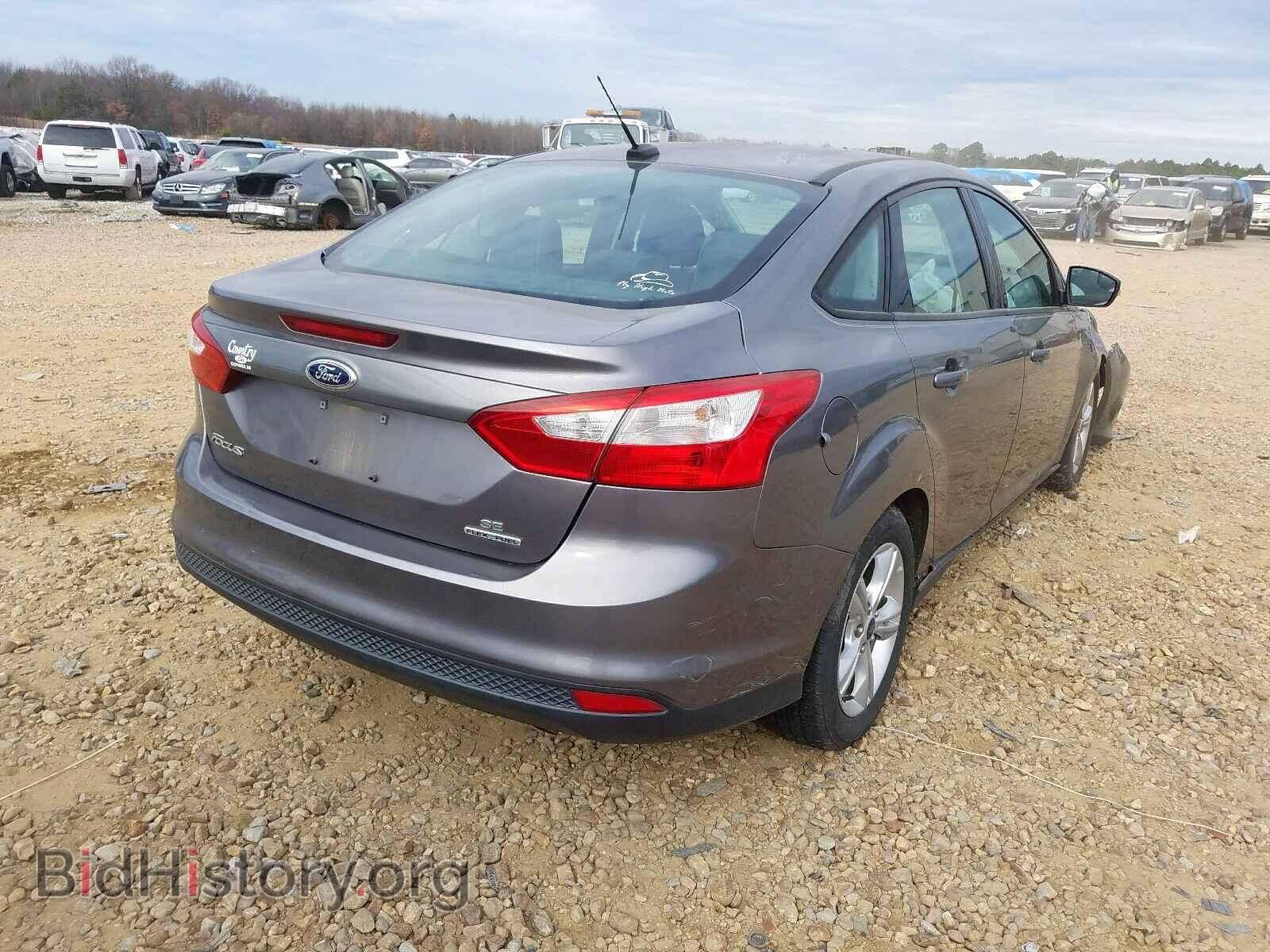 2014 FORD FOCUS - VIN: 1FADP3F2XEL288077 - Photo 4