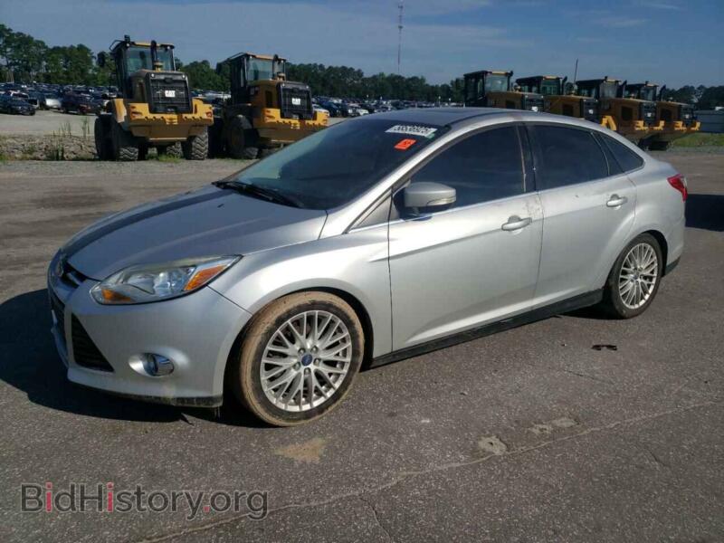2012 Ford FOCUS SEL (VIN 1FAHP3H2XCL102095) — фото 1 из 13, Copart, повреждение: бок