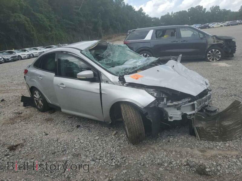 2015 Ford FOCUS (VIN 1FADP3F22FL285921) — photo 4 of 12