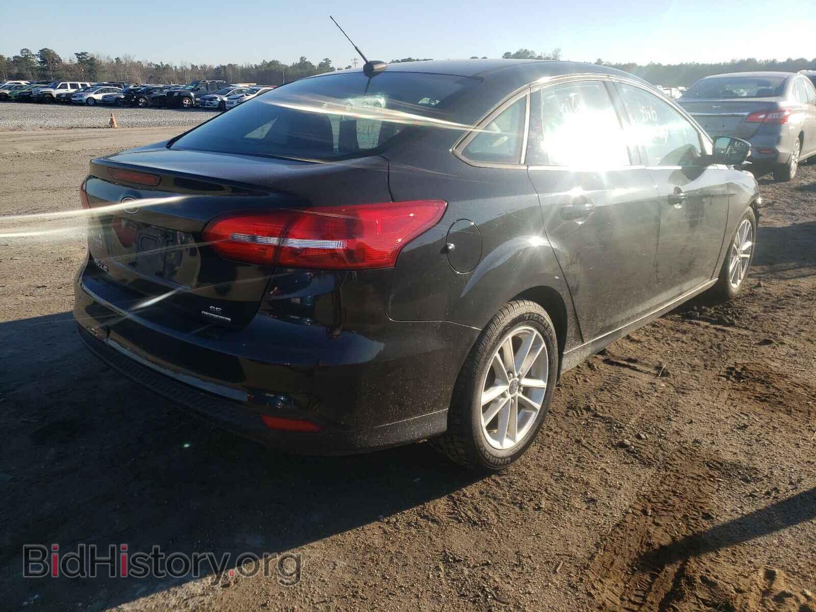 2015 FORD FOCUS - VIN: 1FADP3F27FL384718 - Photo 4