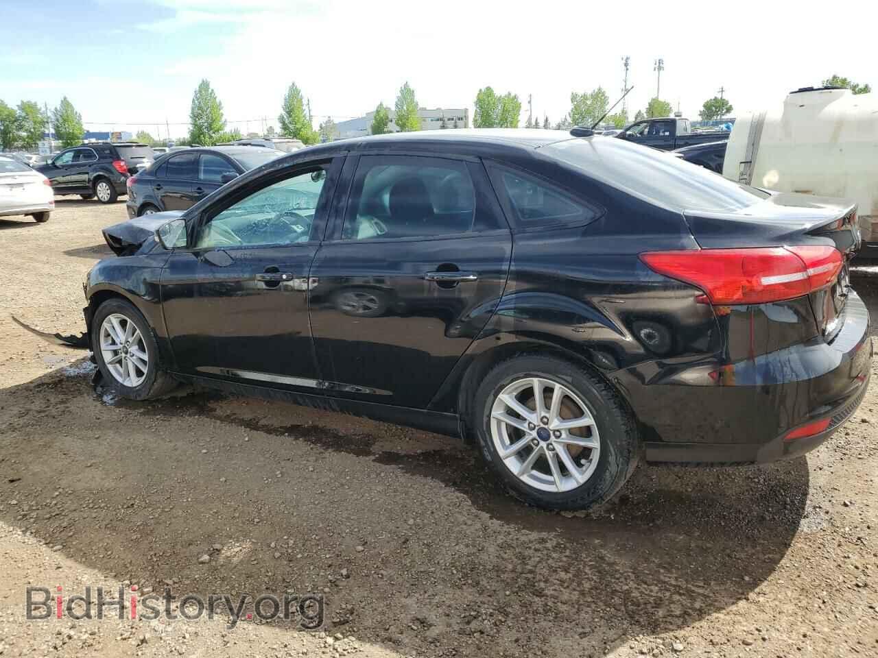 2016 FORD FOCUS - VIN: 1FADP3F26GL312801 - Фото 2