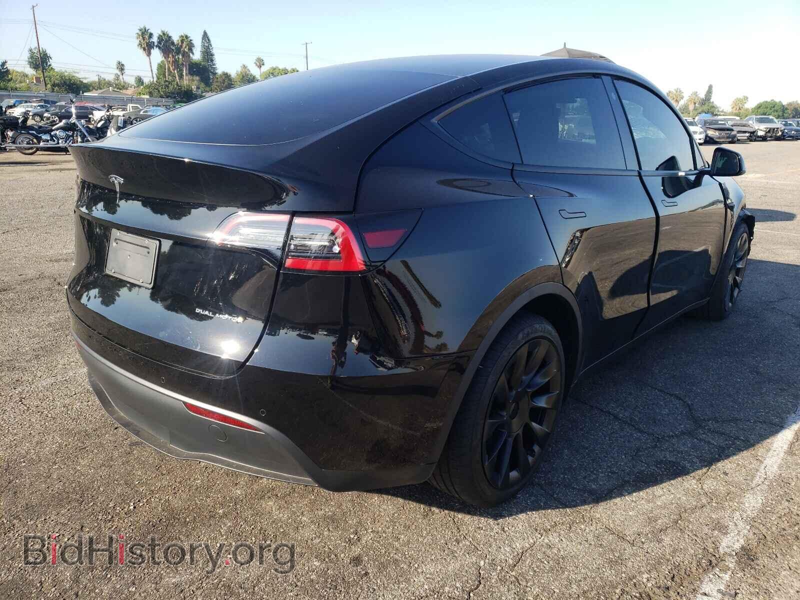 2021 TESLA MODEL Y - VIN: 5YJYGDEE2MF180597 - Photo 4