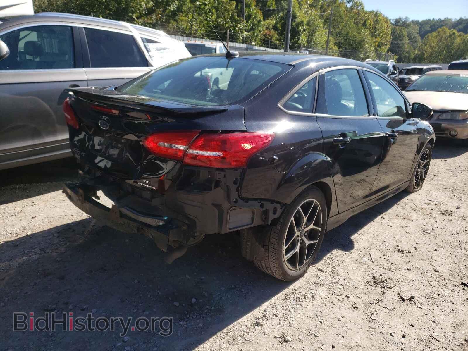 2016 FORD FOCUS - VIN: 1FADP3F2XGL394483 - Фото 4
