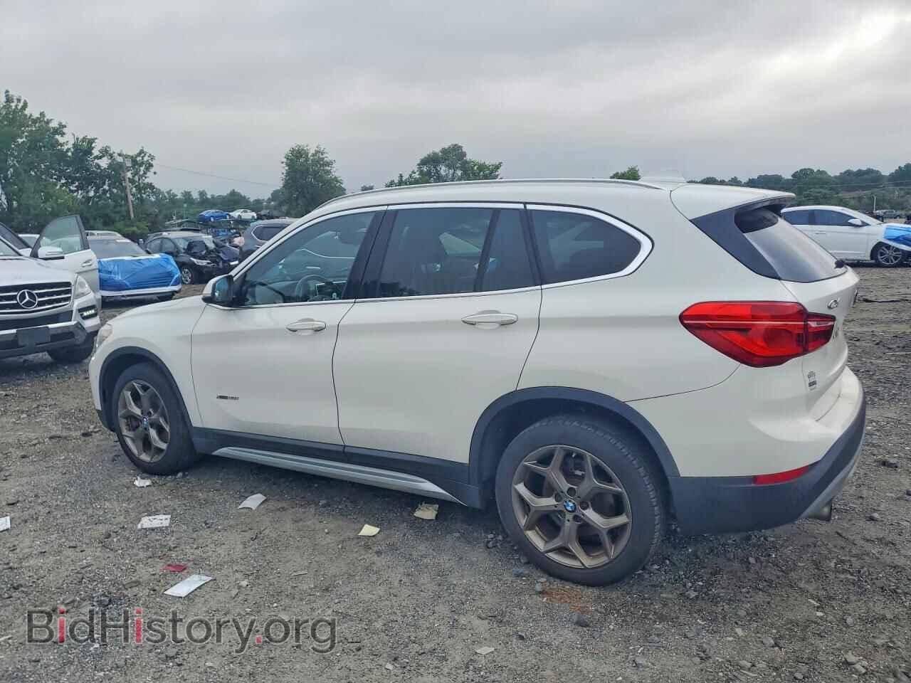 2016 BMW X1 - VIN: WBXHT3Z32G4A48942 - Фото 2
