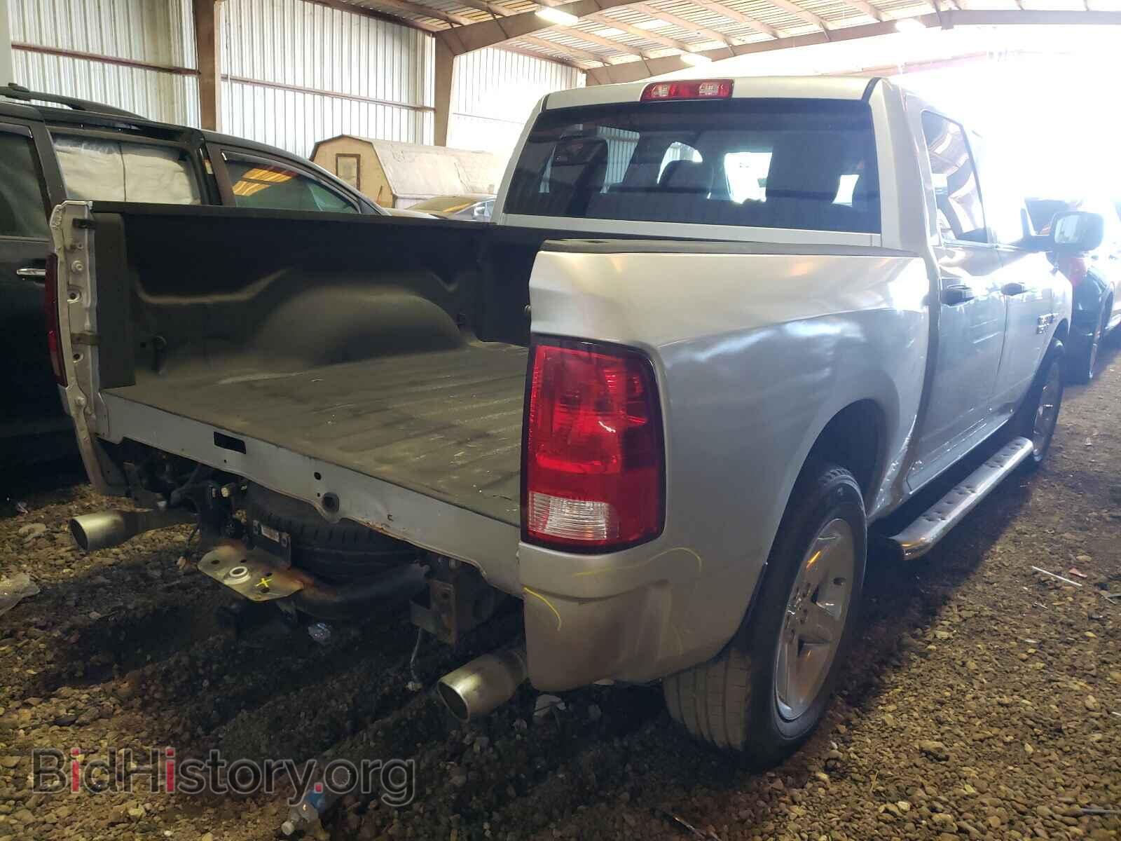 2014 RAM 1500 - VIN: 3C6RR6KT3EG324142 - Фото 4