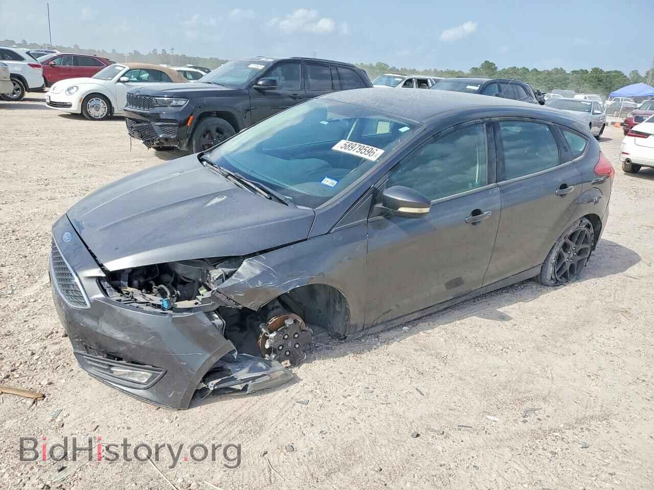 2016 Ford FOCUS SE (VIN 1FADP3K24GL340232) — photo 1 of 12, Copart, damage: front end
