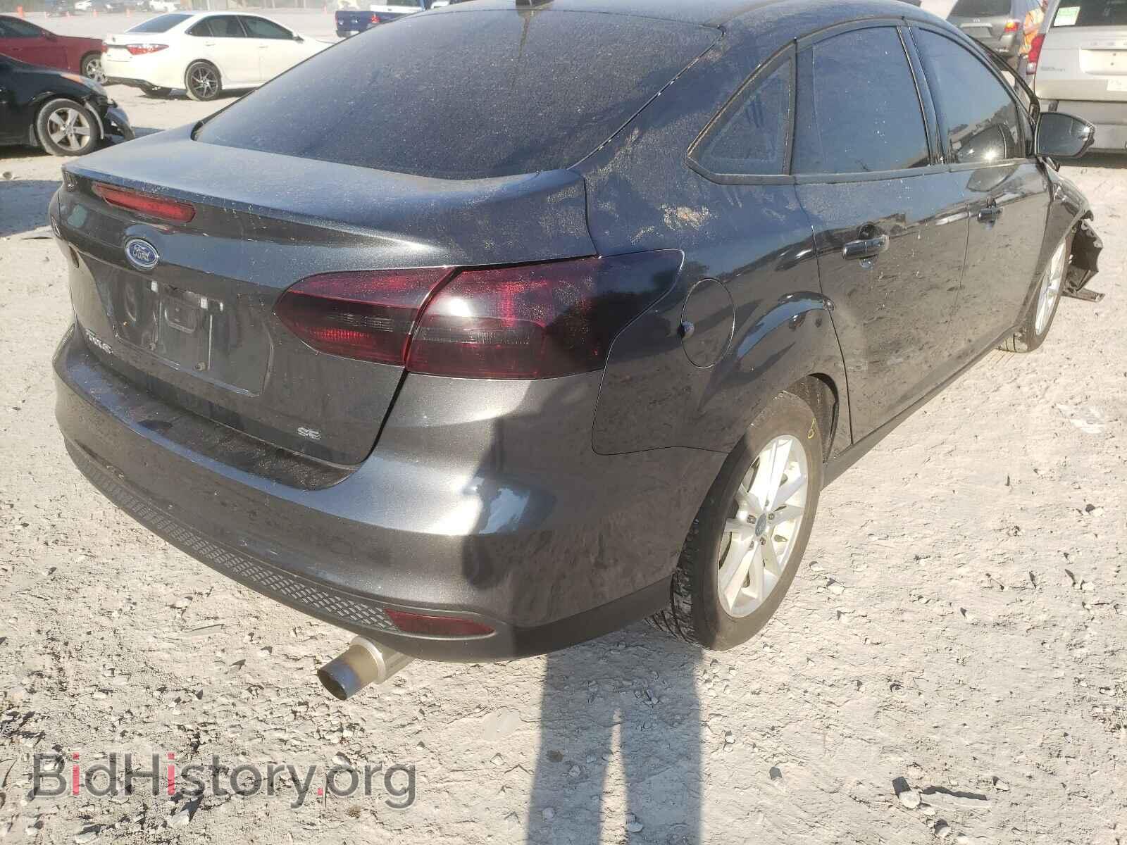 2017 FORD FOCUS - VIN: 1FADP3F25HL215381 - Фото 4
