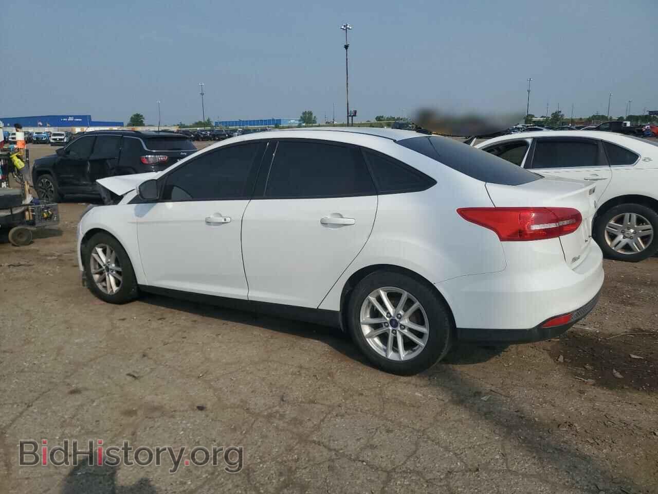 2016 FORD FOCUS - VIN: 1FADP3F23GL404271 - Фото 2