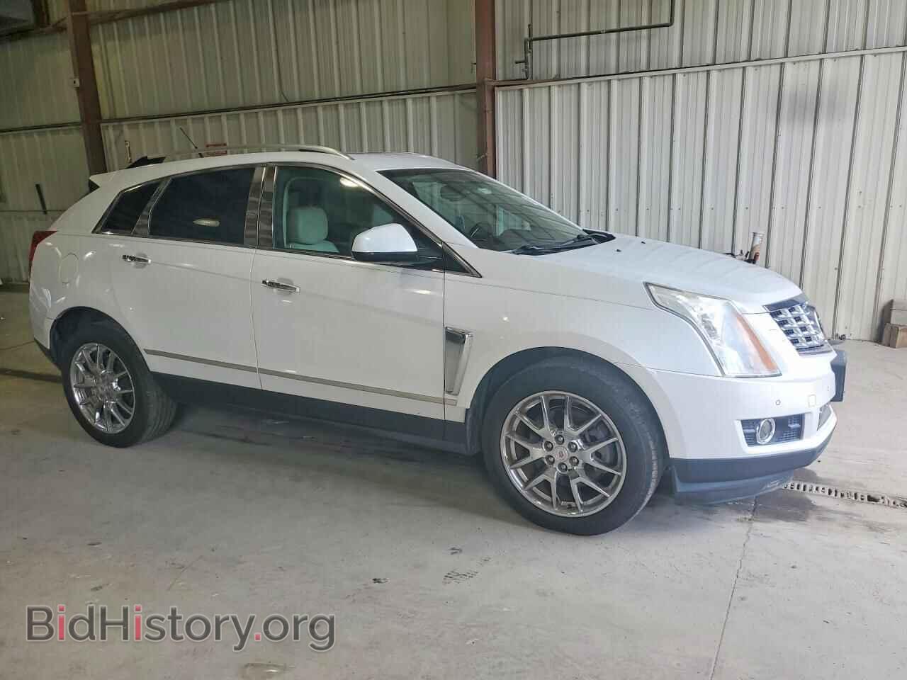 2014 CADILLAC SRX - VIN: 3GYFNDE37ES611708 - Photo 4