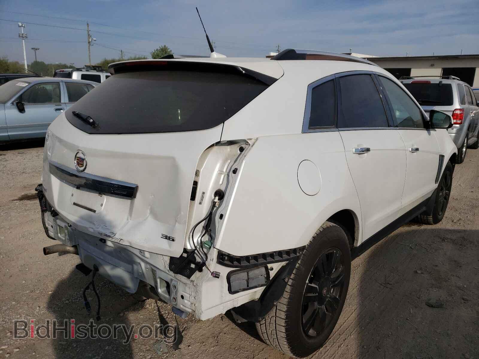 2013 CADILLAC SRX - VIN: 3GYFNCE31DS535668 - Фото 4