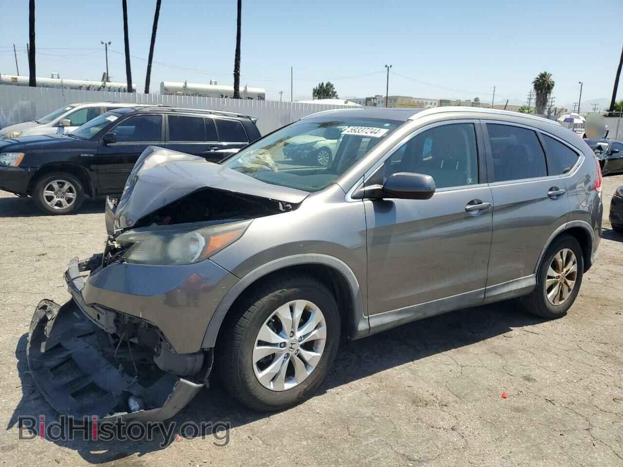 Фотография JHLRM3H76CC010004 - HONDA CRV 2012