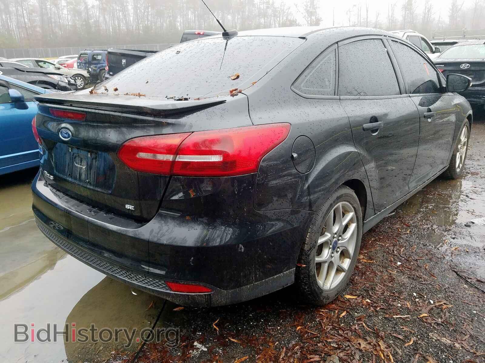 2015 FORD FOCUS - VIN: 1FADP3F21FL336504 - Photo 4