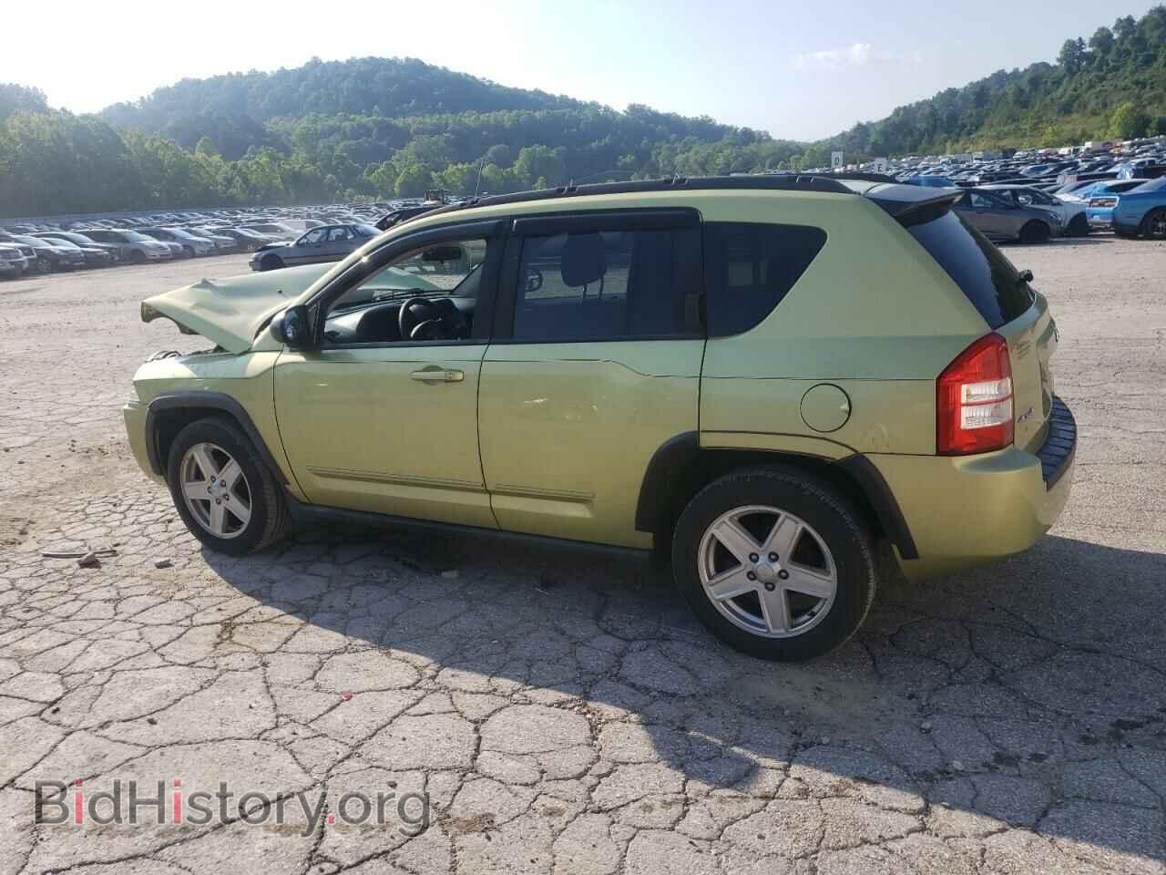2010 JEEP COMPASS - VIN: 1J4NF4FB2AD504252 - Photo 2