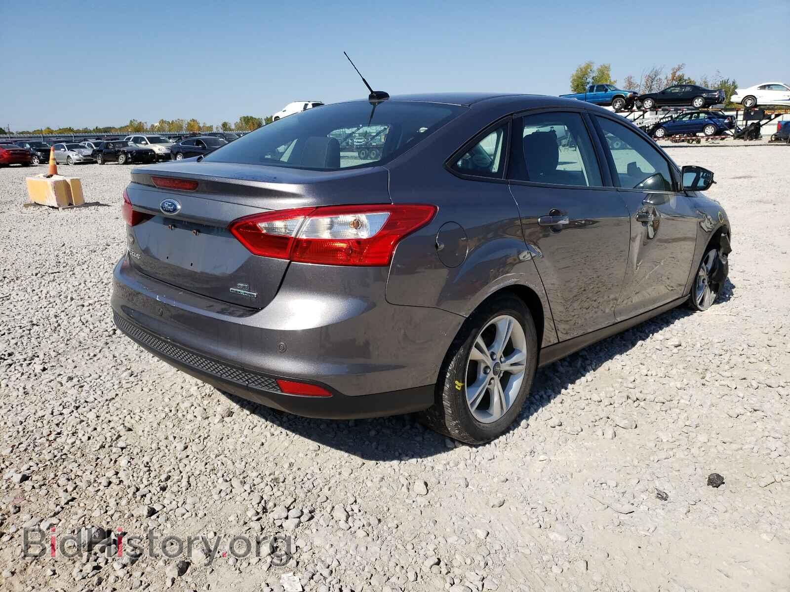 2014 FORD FOCUS - VIN: 1FADP3F29EL411061 - Photo 4