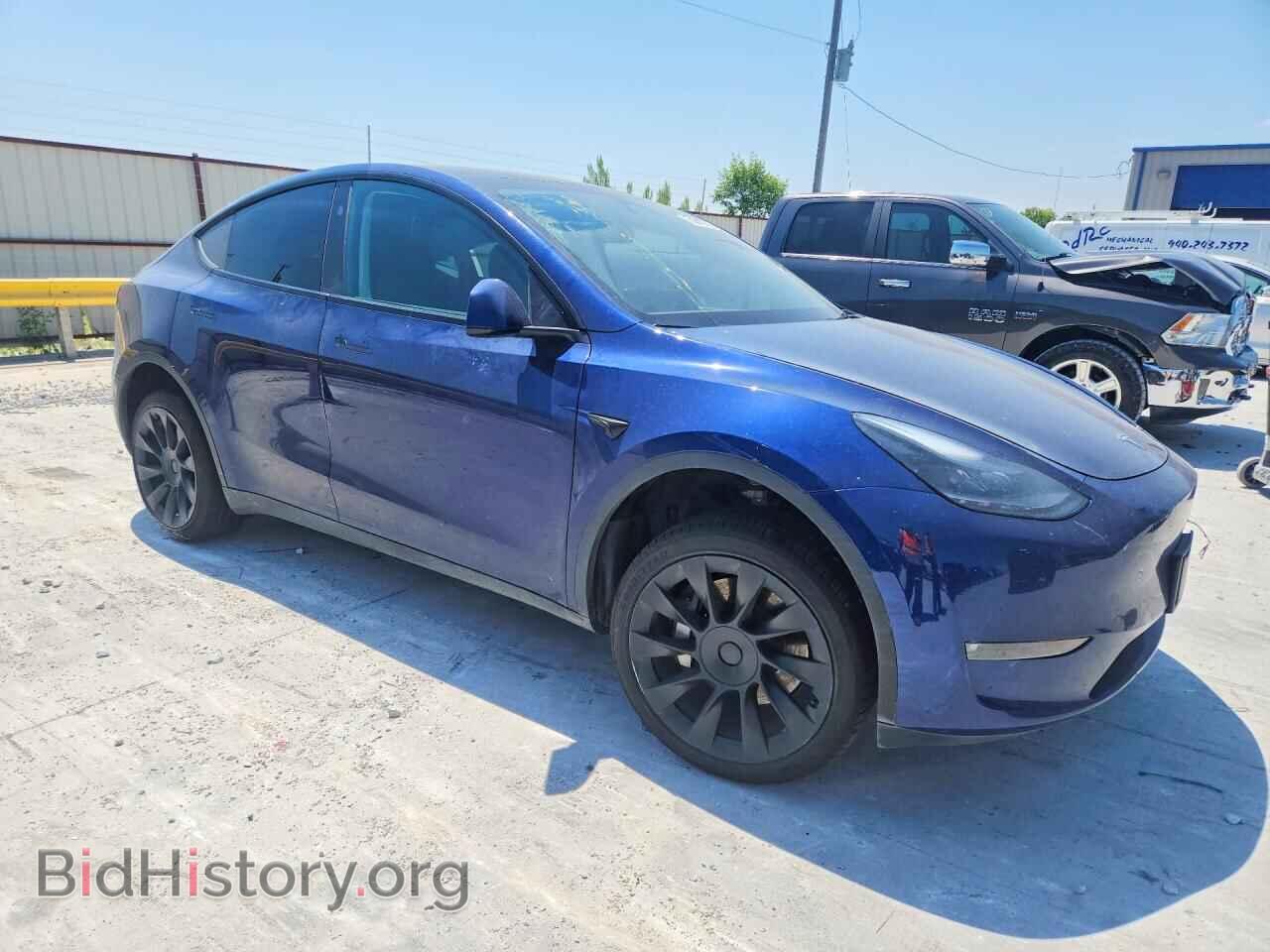 2023 TESLA MODEL Y - VIN: 7SAYGDEE3PF874366 - Photo 4