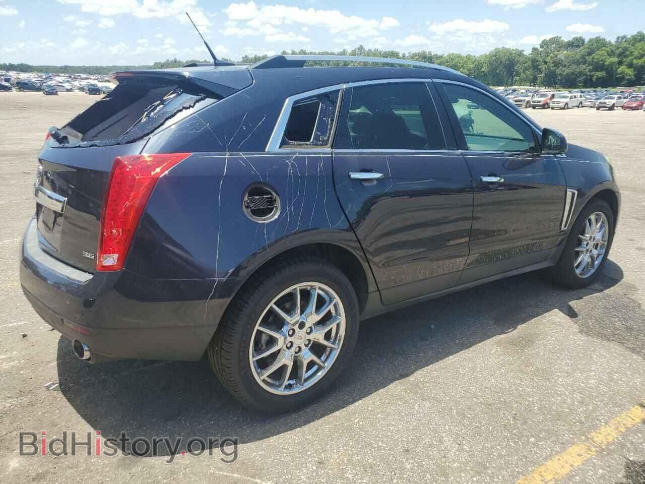2014 CADILLAC SRX - VIN: 3GYFNDE31ES627340 - Фото 3