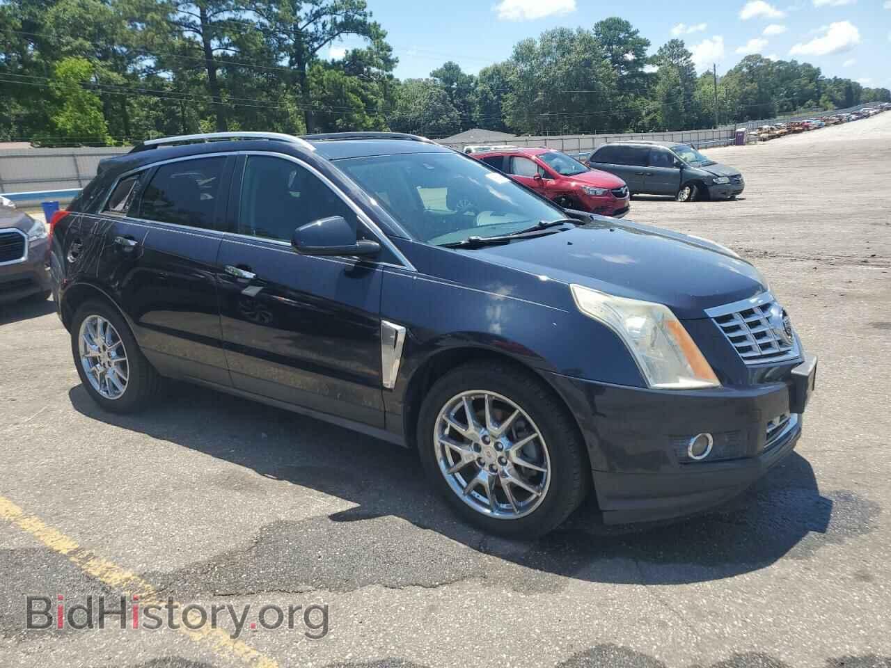2014 CADILLAC SRX - VIN: 3GYFNDE31ES627340 - Фото 4