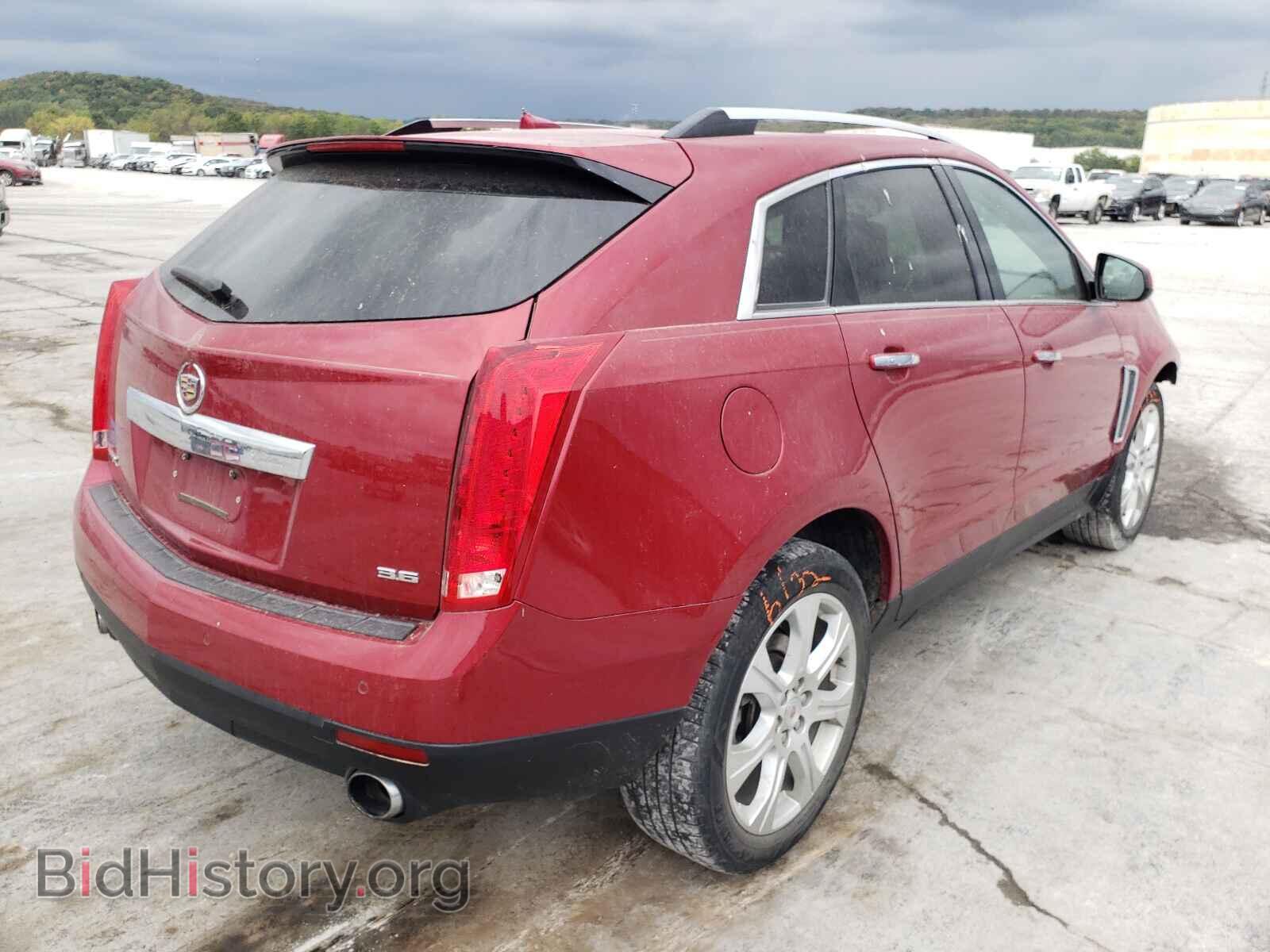 2014 CADILLAC SRX - VIN: 3GYFNDE37ES584168 - Фото 4