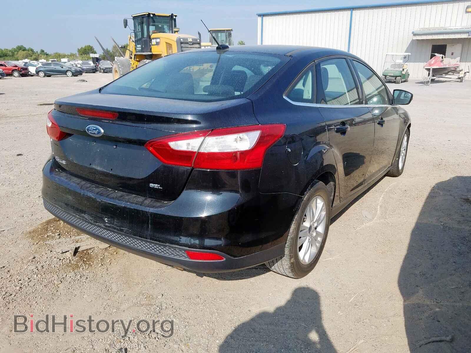 2012 FORD FOCUS - VIN: 1FAHP3H21CL122879 - Photo 4