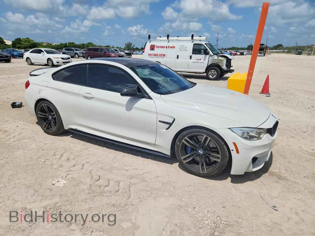 2015 BMW M4 - VIN: WBS3R9C50FK333707 - Photo 4