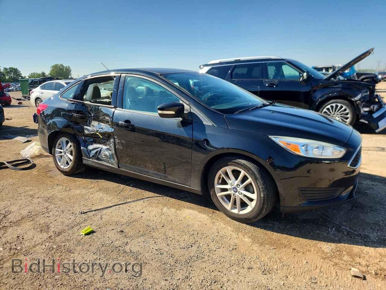 2015 FORD FOCUS - VIN: 1FADP3F26FL361852 - Photo 4