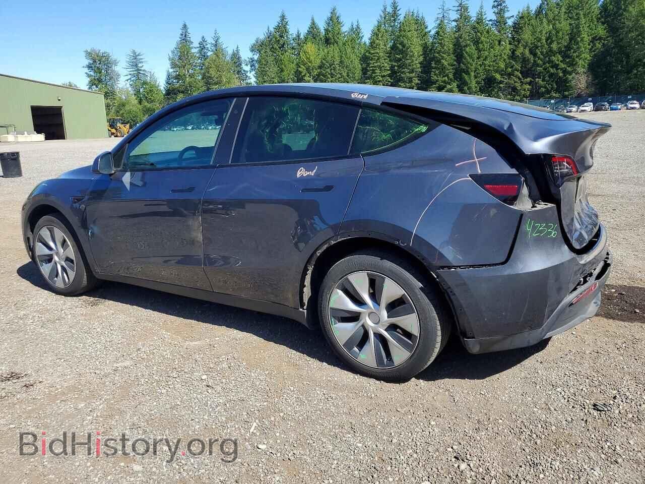 2023 TESLA MODEL Y - VIN: 7SAYGDEEXPF607774 - Фото 2