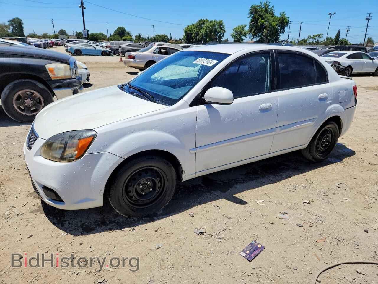 Фотография KNADH4A39A6692121 - KIA RIO 2010