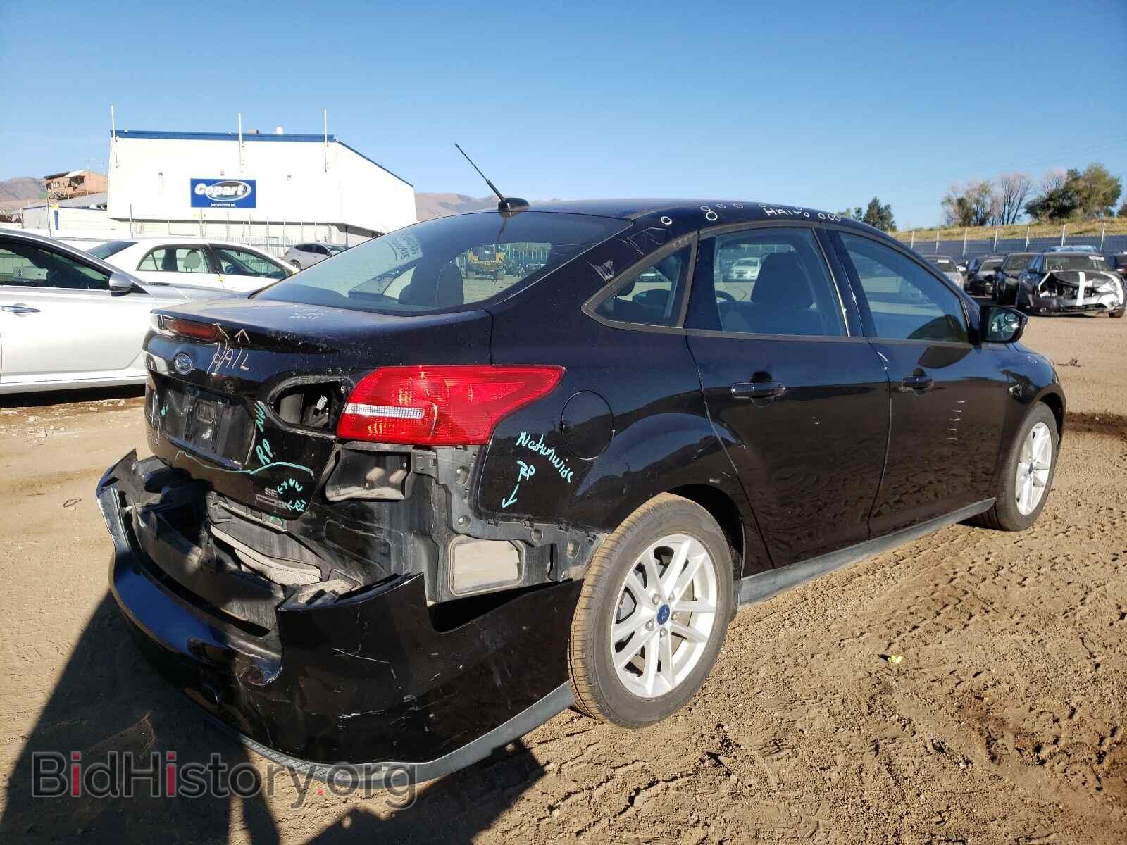 2015 FORD FOCUS - VIN: 1FADP3F25FL244635 - Photo 4