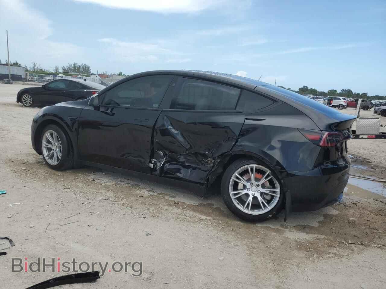 2023 TESLA MODEL Y - VIN: 7SAYGAEE1PF931162 - Фото 2