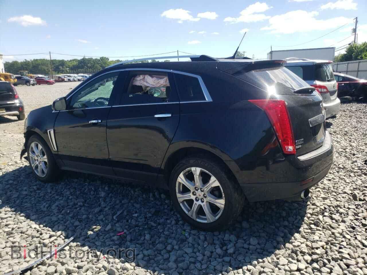 2013 CADILLAC SRX - VIN: 3GYFNDE3XDS620062 - Фото 2