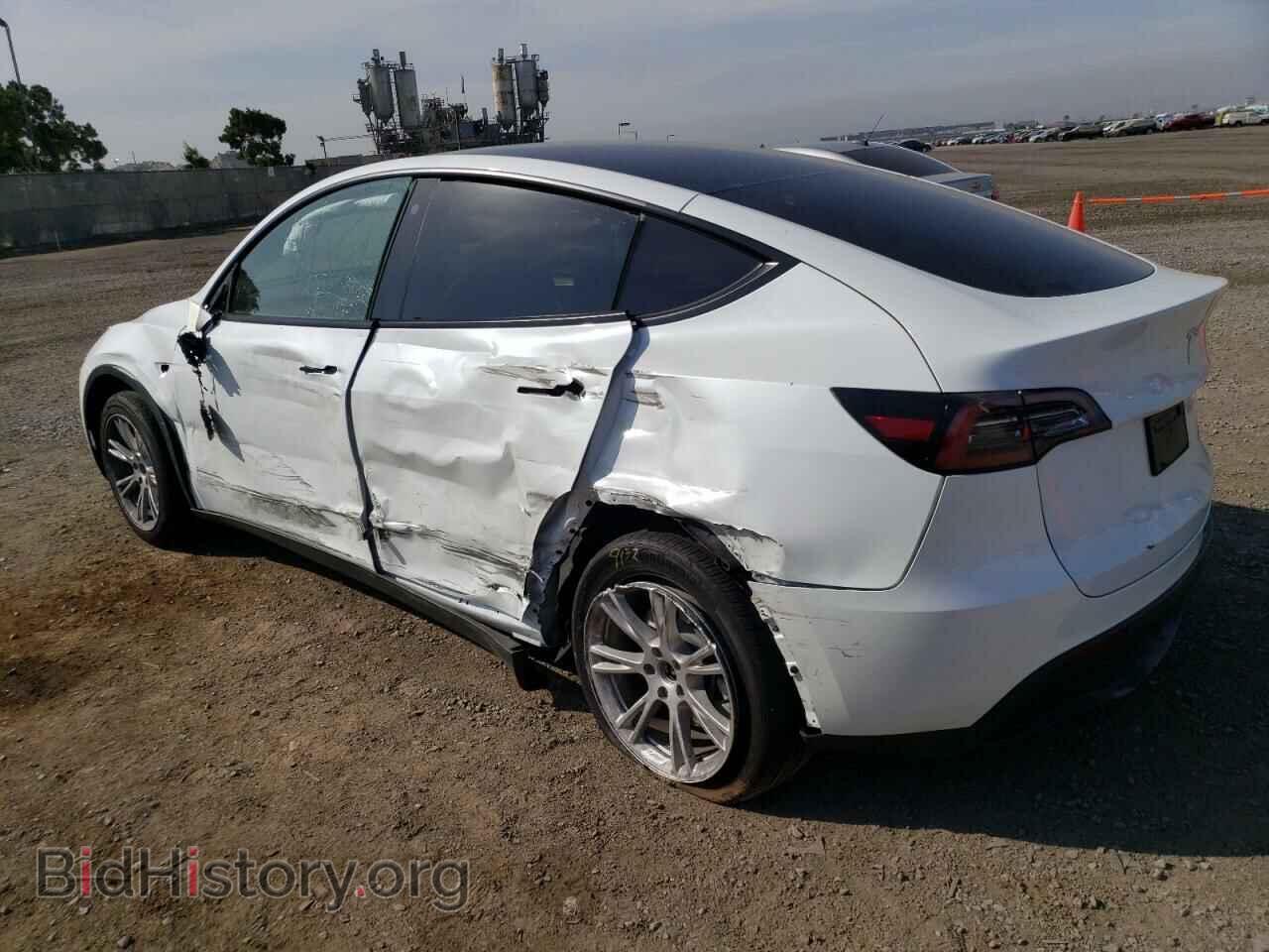 2023 TESLA MODEL Y - VIN: 7SAYGAEE7PF777654 - Photo 2