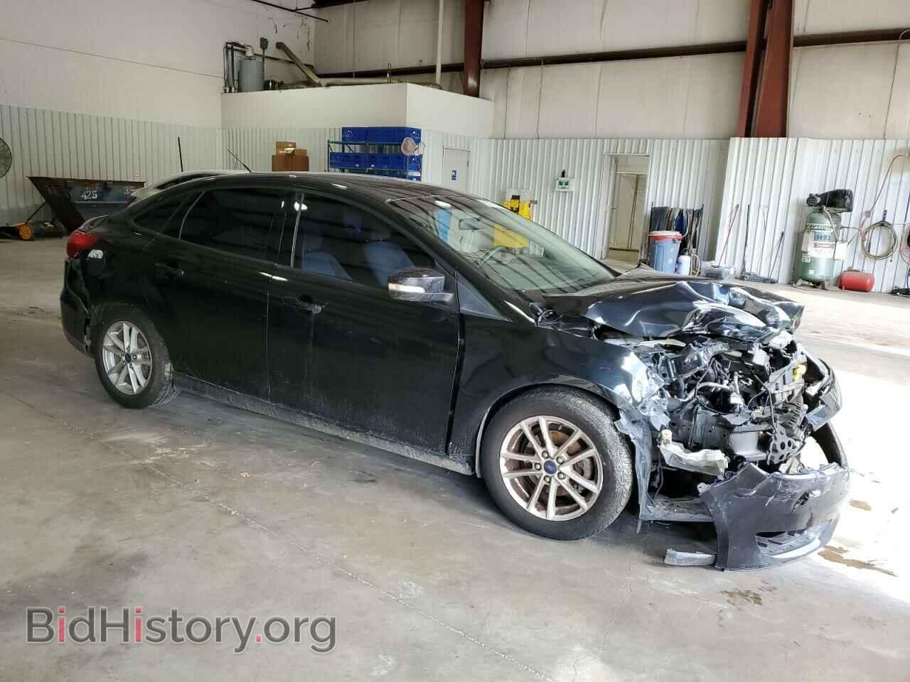 2015 FORD FOCUS - VIN: 1FADP3F22FL215318 - Photo 4