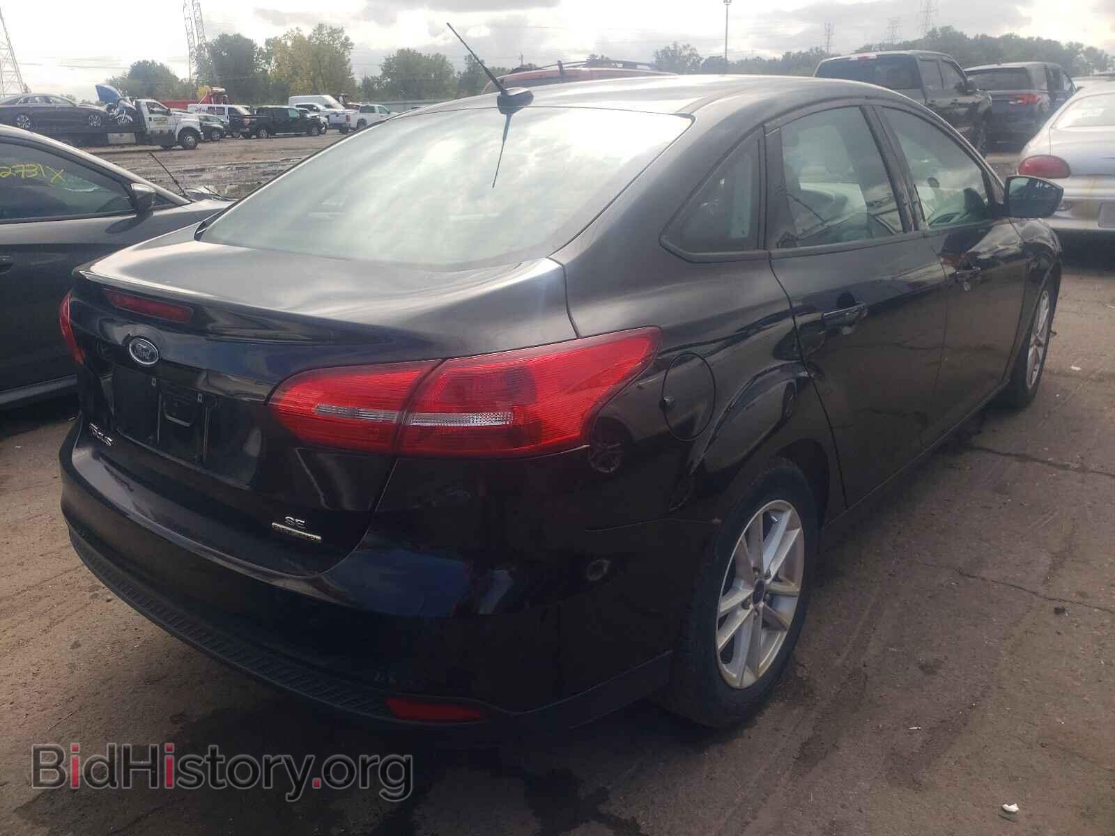 2016 FORD FOCUS - VIN: 1FADP3F21GL203811 - Photo 4