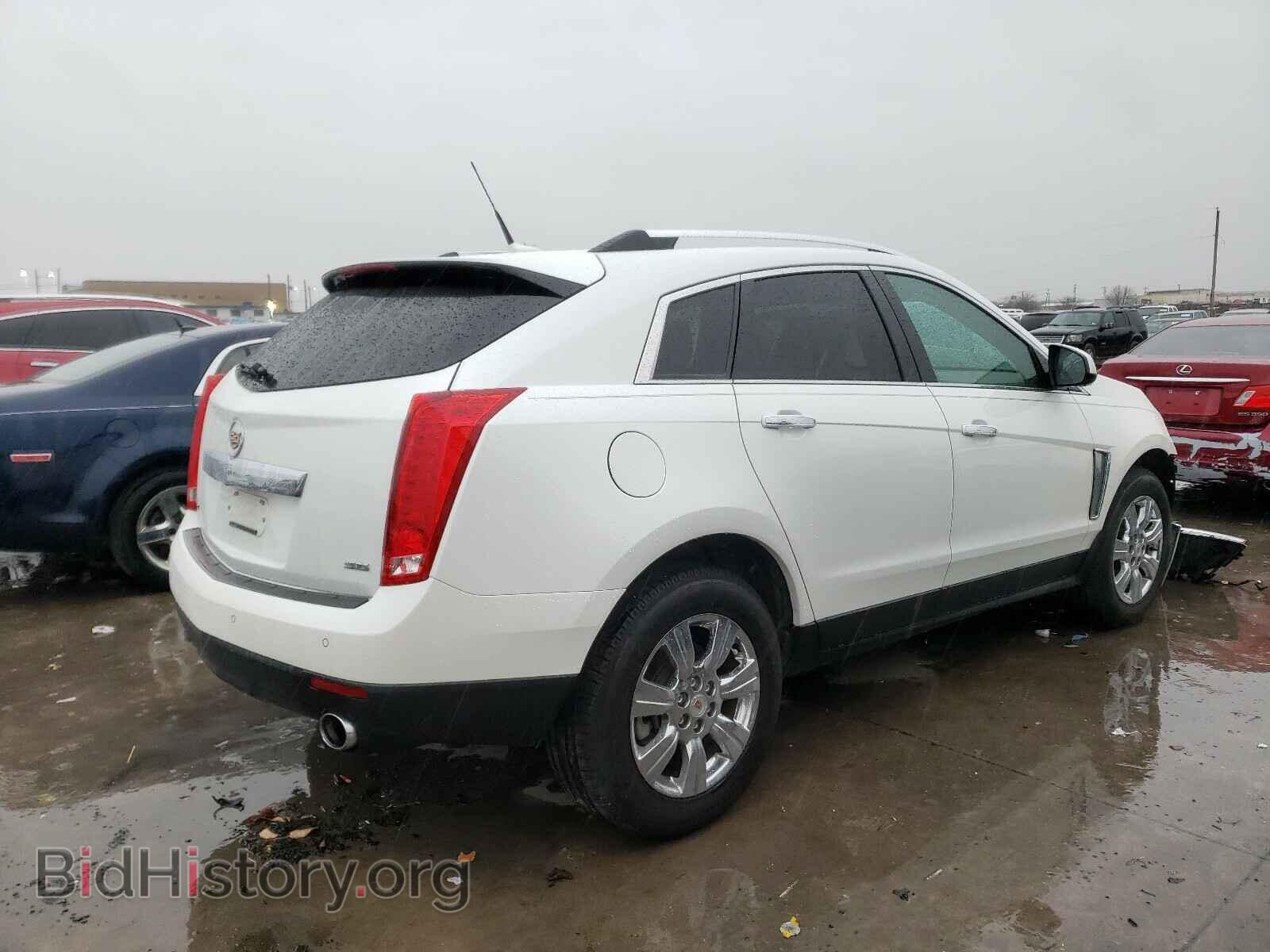 2014 CADILLAC SRX - VIN: 3GYFNBE37ES557931 - Фото 4