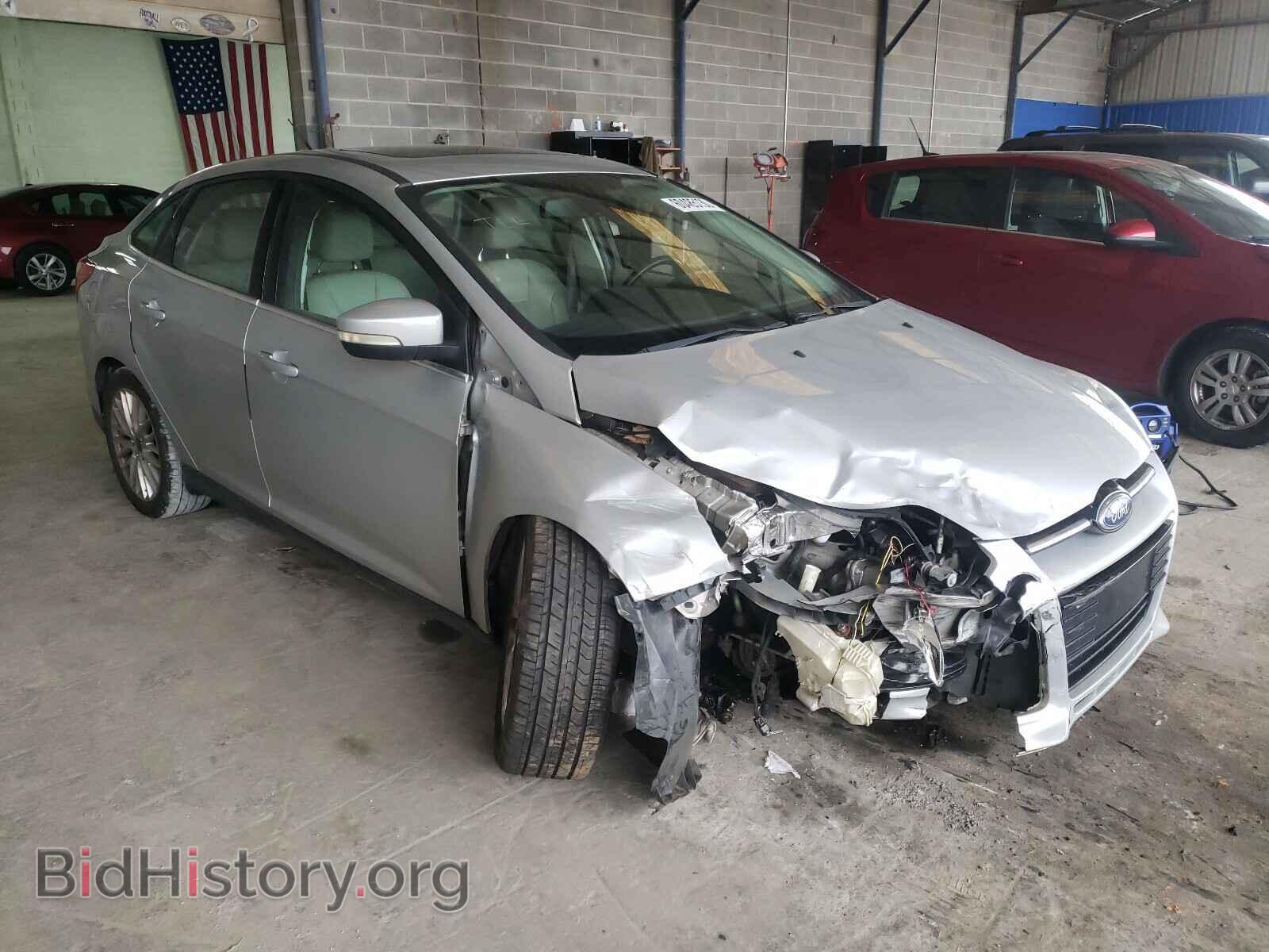 Фотография 1FAHP3H21CL317641 - FORD FOCUS 2012