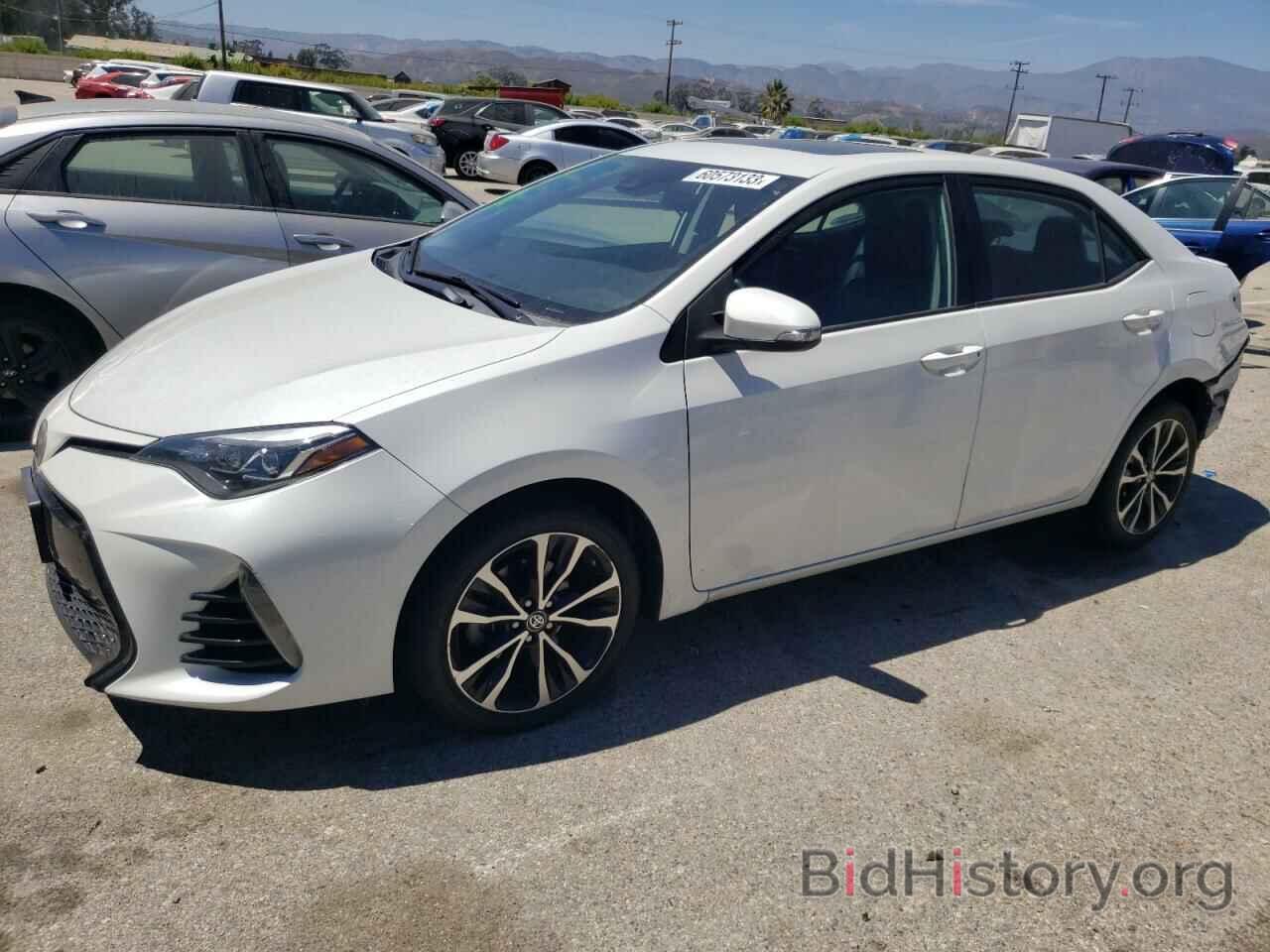 Photo 5YFBURHE0JP746831 - TOYOTA COROLLA 2018