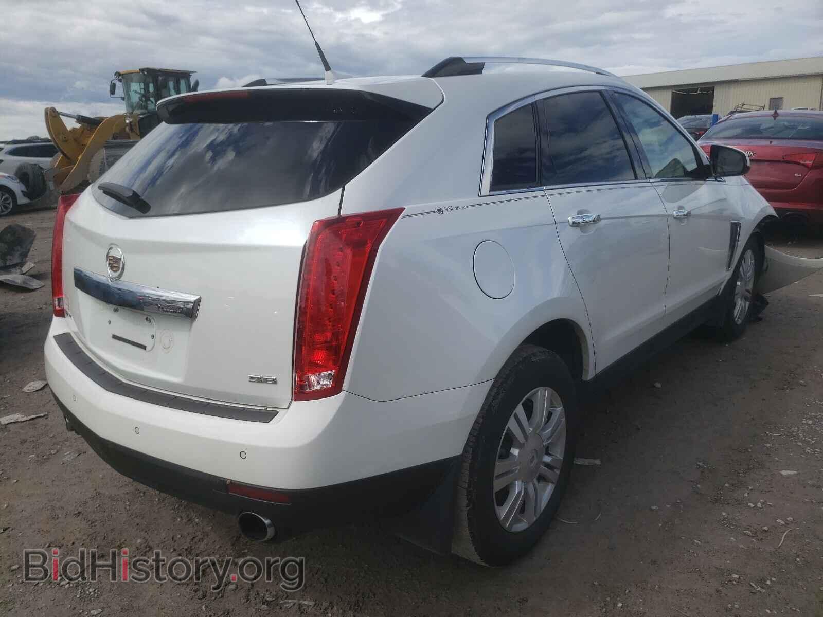 2013 CADILLAC SRX - VIN: 3GYFNCE36DS522365 - Фото 4