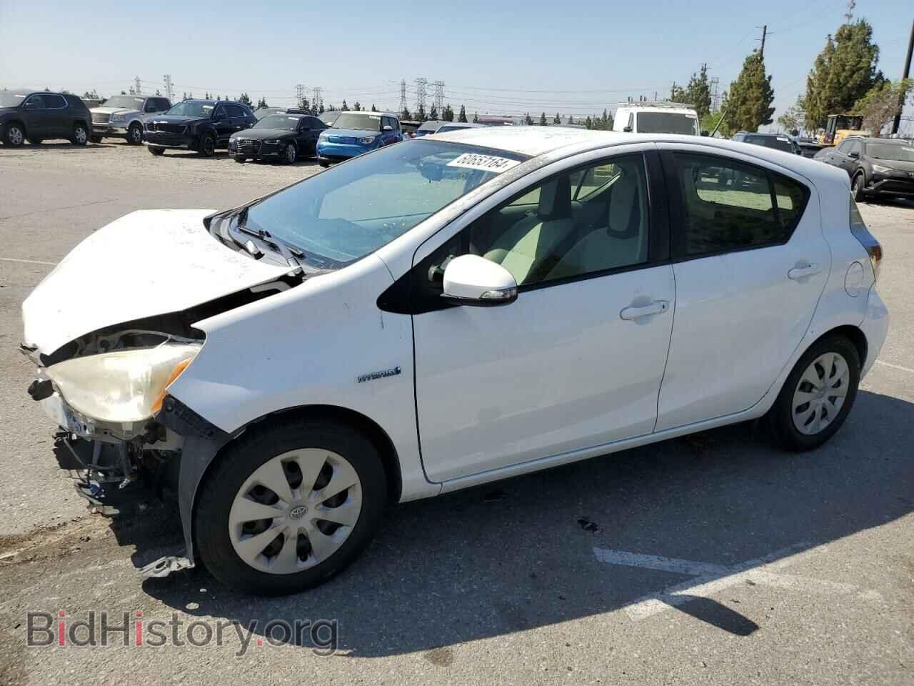 Фотография JTDKDTB34C1521209 - TOYOTA PRIUS 2012
