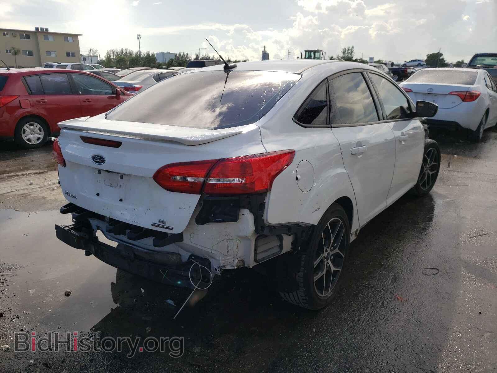 2015 FORD FOCUS - VIN: 1FADP3F26FL215211 - Photo 4