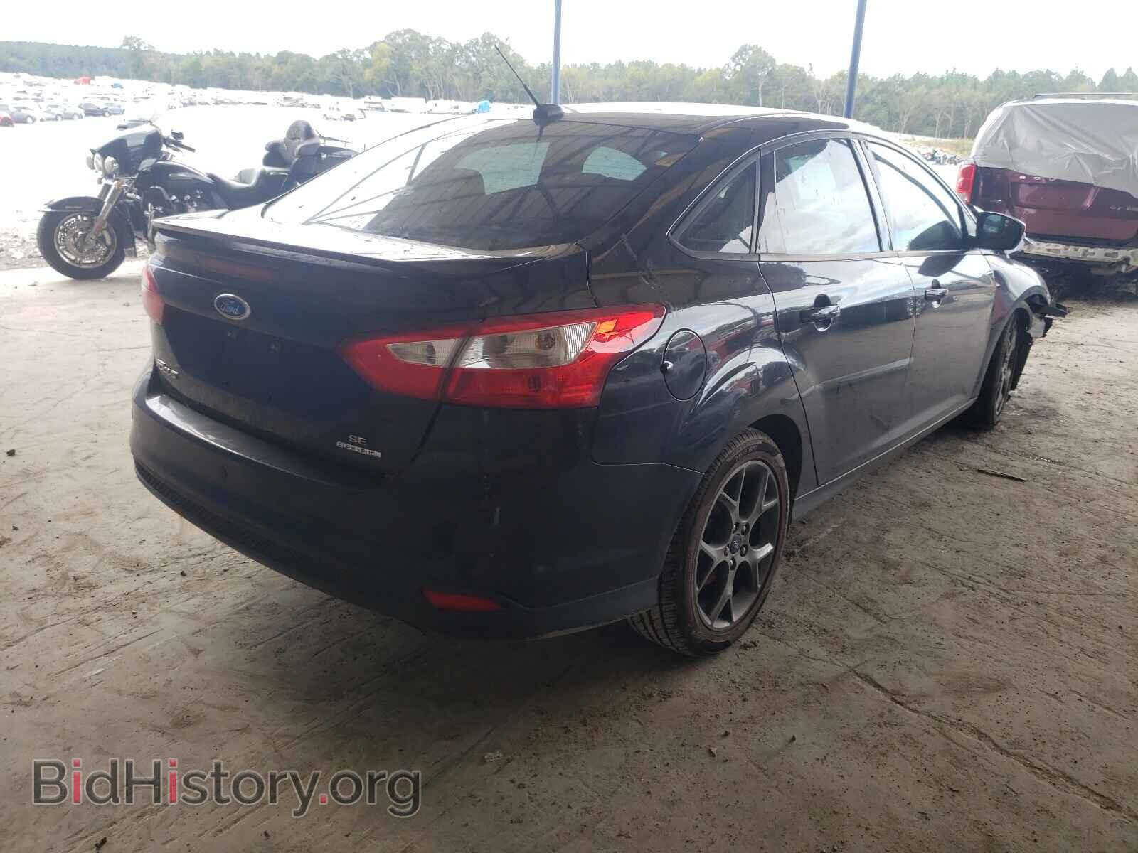 2014 FORD FOCUS - VIN: 1FADP3F20EL114972 - Photo 4