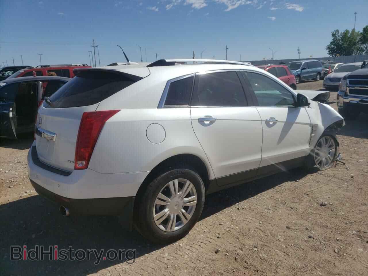 2012 CADILLAC SRX - VIN: 3GYFNAE37CS654120 - Фото 4