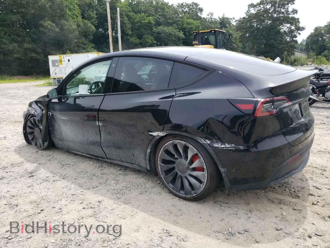 2023 TESLA MODEL Y - VIN: 7SAYGDEF9PF615129 - Фото 2