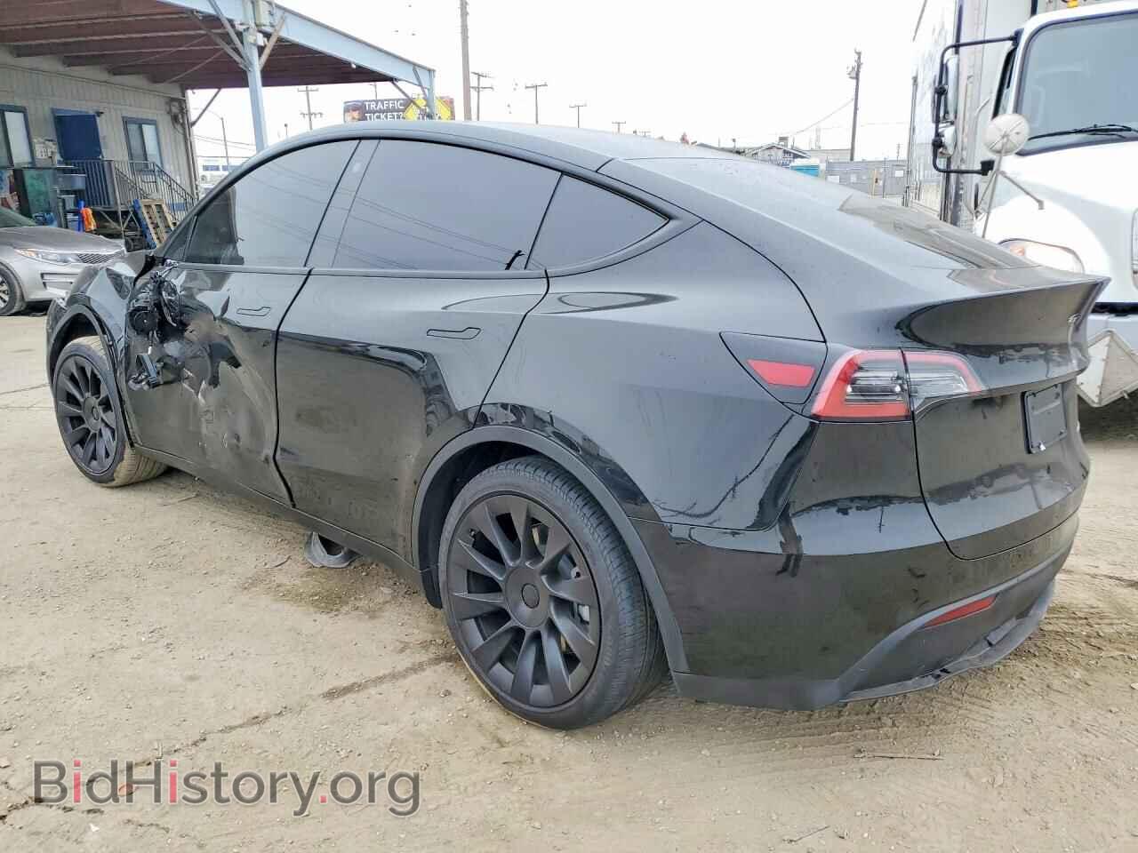 2023 TESLA MODEL Y - VIN: 7SAYGDEE0PA109905 - Photo 2