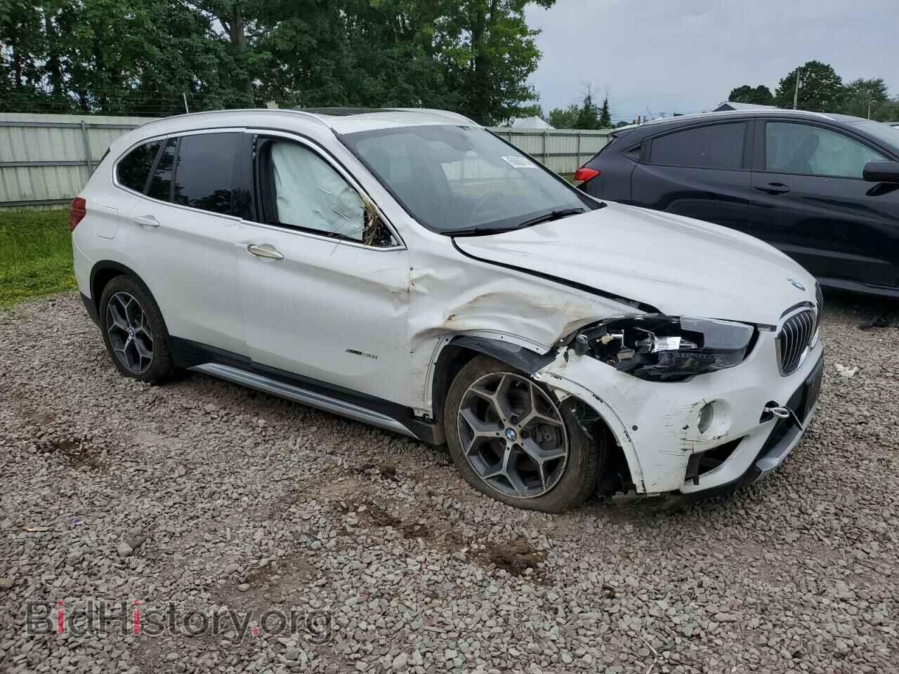 2017 BMW X1 - VIN: WBXHT3C33H5F80415 - Фото 4