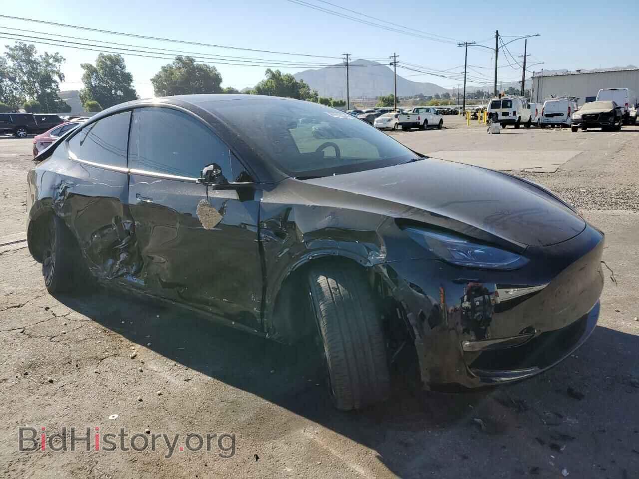 2023 TESLA MODEL Y - VIN: 7SAYGAEE3PF772953 - Photo 4