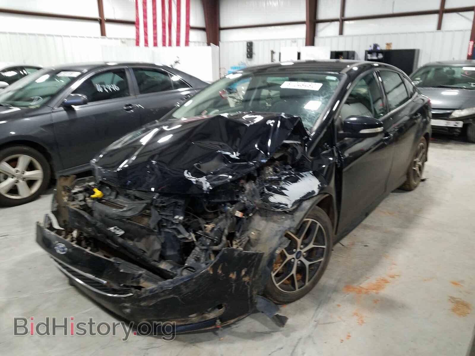 2016 FORD FOCUS - VIN: 1FADP3F21GL389463 - Photo 2